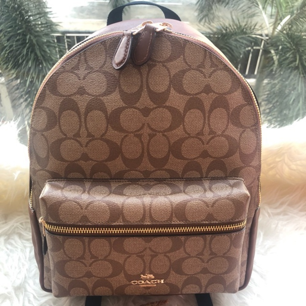 Coach medium charlie signature canvas purple